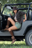 Woman wears Juzo Adventure and gets out of an off-road vehicle