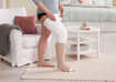 Femme portant Juzo SoftCompress sur la cuisse